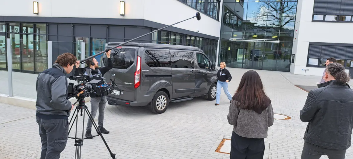 Camera crew outdoor interview